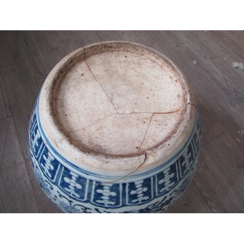 9039 - A Chinese blue and white jardinière in the Ming style, all-over scrolled foliate patterns, 35.5cm di... 