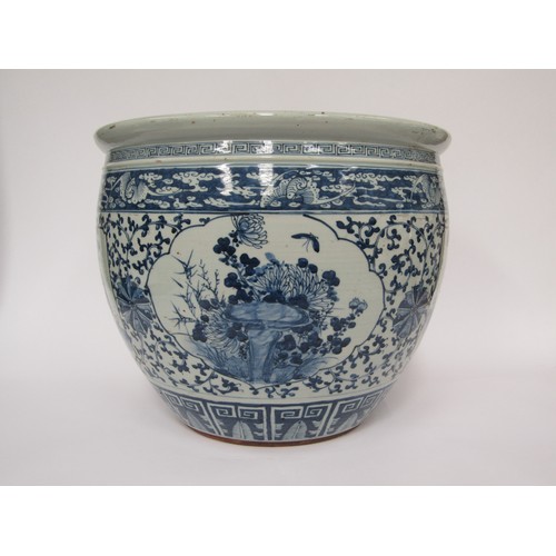 9038 - A Chinese blue and white jardinière with figural and foliate cartouches, bar and cloud border, 26cm ... 