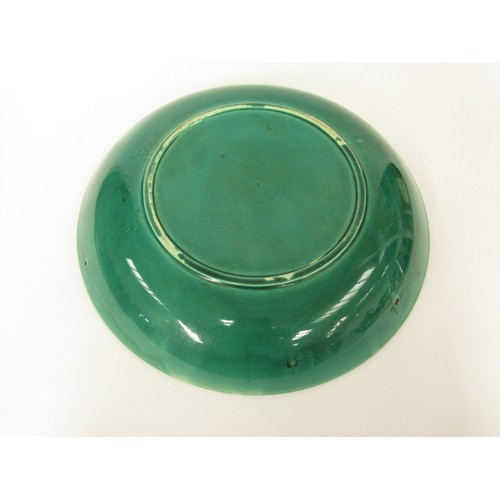 9037 - WITHDRAWN: A Chinese green glazed charger, 42.5cm diameter