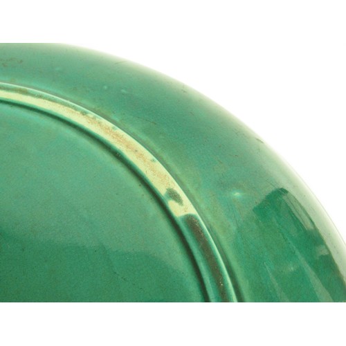 9037 - WITHDRAWN: A Chinese green glazed charger, 42.5cm diameter