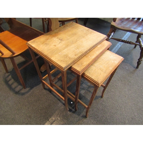 1057 - A nest of three occasional tables