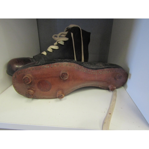 1257 - A pair of vintage 1940's/50's Spalding football boots, blackened tan leather