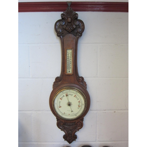 1007 - A Short & Mason, London, carved oak banjo barometer and thermometer, 90cm high     (R) £15