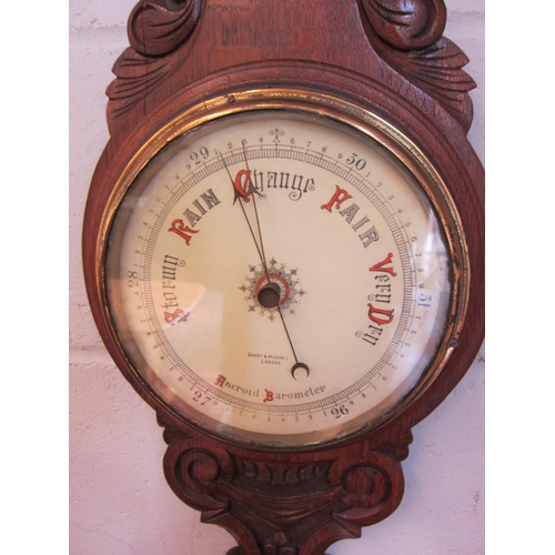 1007 - A Short & Mason, London, carved oak banjo barometer and thermometer, 90cm high     (R) £15
