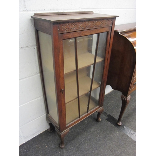 1023 - An early to mid 20th Century oak china display cabinet with Deco styling, 113cm high x 57cm wide x 2... 