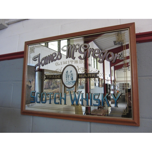 1051 - An advertising mirror for James McGregor Scotch Whisky, framed, 52cm x 76cm