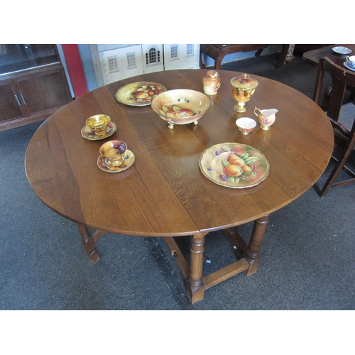 1081 - An oak gate-leg dining table, 143cm x 126cm     (R) £50