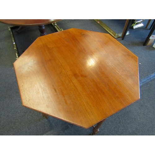 1095 - An Edwardian walnut two tier lamp table on castors, 81cm high x 81cm wide     (R) £15