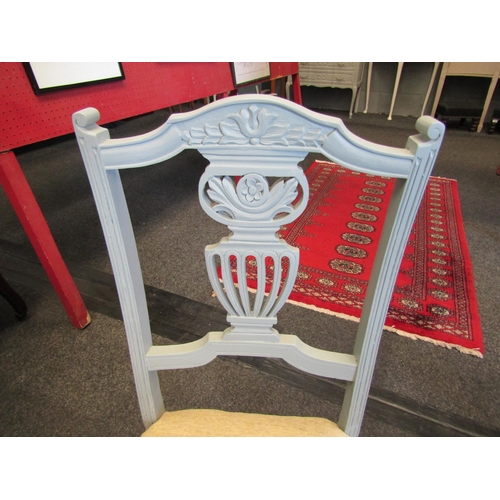 1099 - A late Victorian walnut nursing chair painted in pale blue, with elephant design upholstered seat, t... 