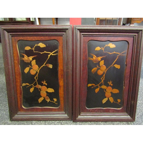 1112 - A pair of Japanese gilt lacquered wall panels depicting birds and fruiting trees, framed, 28cm x 15c... 