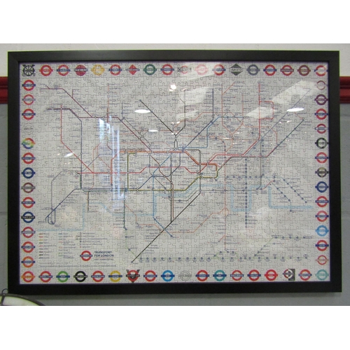 1251 - A Transport for London Underground map 1000 piece jigsaw, framed and glazed.  Image size 48cm x 67cm