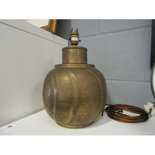 1252 - A planished brass table lamp, 31cm high