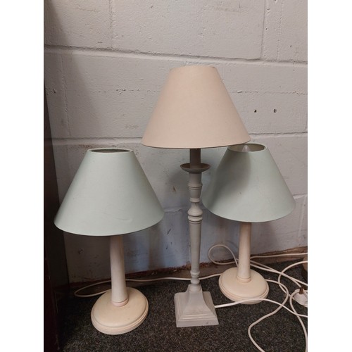 1055 - A collection of six assorted lamps, an adjustable standard lamp and five table lamps     (E) £10-15