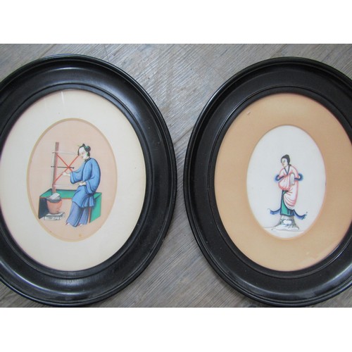 9025 - Four late 19th Century Oriental paintings on silk two depicting a female figure in the act of making... 