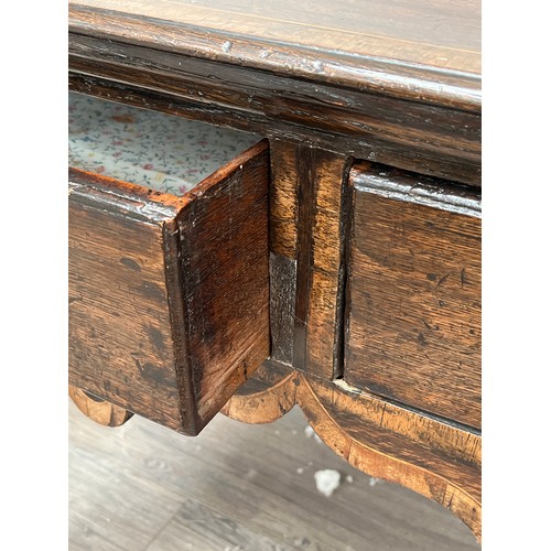 9011 - A Georgian oak lowboy with two drawers on cabriole legs to pad feet, 75cm x 96cm x 55cm