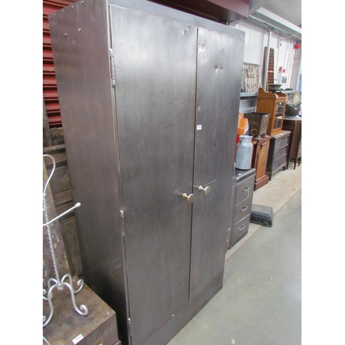 3498 - An industrial metal two door cupboard