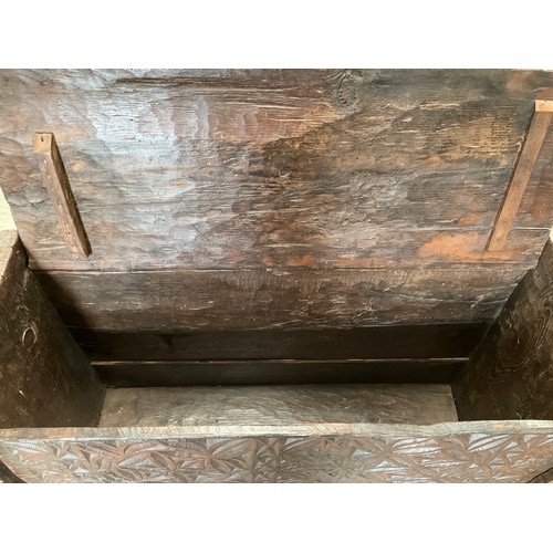 9022A - An Eastern carved wood chest, foliate front panel, lift plank lid, 87cm x 132cm x 48cm  (R)  £150