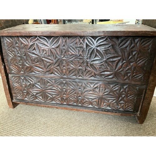 9022A - An Eastern carved wood chest, foliate front panel, lift plank lid, 87cm x 132cm x 48cm  (R)  £150