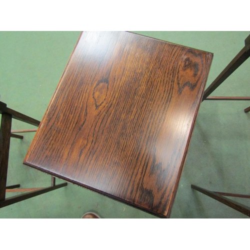 4009 - A Waring & Gillow oak nest of three tables, makers plaque to base, 53cm high x 44cm wide x 33cm deep... 