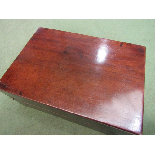 4012 - A mahogany writing slope with red tooled leather interior and secret drawers