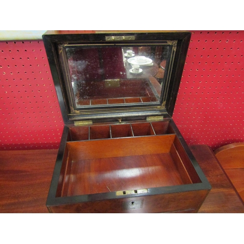 4023 - A 19th Century walnut vanity come sewing box with mirror to interior of the lid, compartmental inter... 