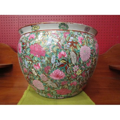 4027 - An Oriental bowl/planter with goldfish design to interior, floral design with figural panels to exte... 