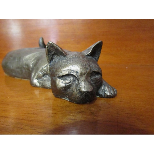 4028 - A Frith Sculpture of a cat stretching, with Paul Jenkins initials, 16cm long