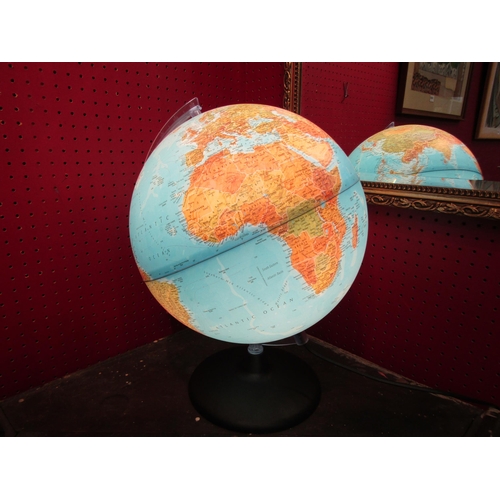 4037 - A light-up World desk globe. 30cm diameter            (E) £15-25