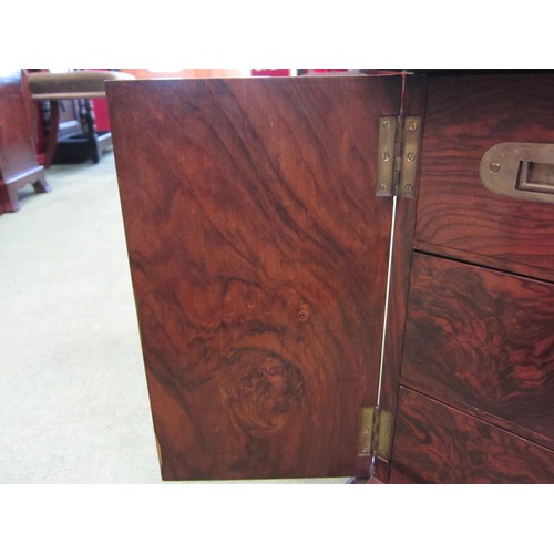 4013 - A figured walnut desktop campaign chest having two short over two long compartmented drawers, later ... 