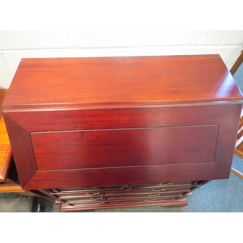 1060 - A Georgian style mahogany bureau, the drop-flap revealing a fitted interior, two short over three lo... 