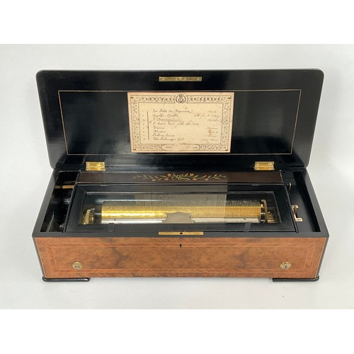 8010 - A late 19th Century Bremond cylinder music box playing 8 airs, with zither, flame walnut case and eb... 