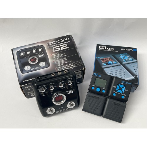 8067 - A Zoom G1 effects pedal together with a G2 pedal, both boxed (2)