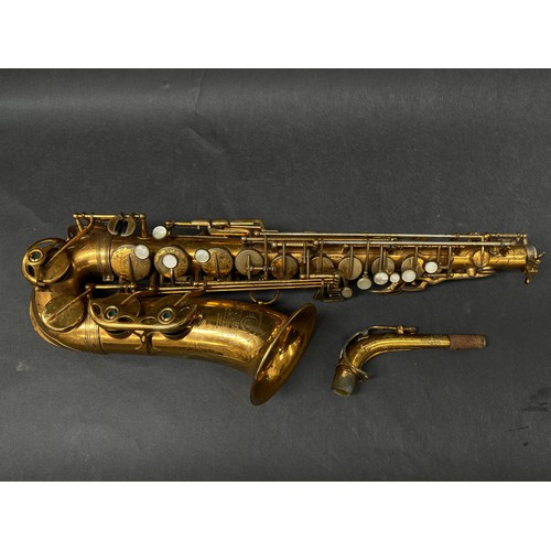 8002 - A Selmer MkVI saxophone, lacquered brass, with neck and mouthpiece, circa 1955, serial No.M59857, wi... 