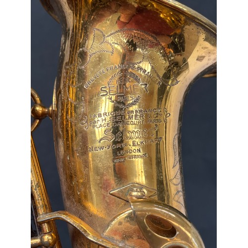 8002 - A Selmer MkVI saxophone, lacquered brass, with neck and mouthpiece, circa 1955, serial No.M59857, wi... 