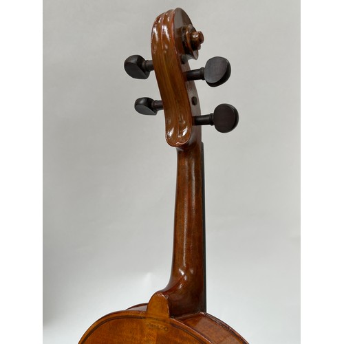 8055 - A 20th Century full size violin (4/4), label marked Monzino & Son, Stradivante, heavily restored, ca... 