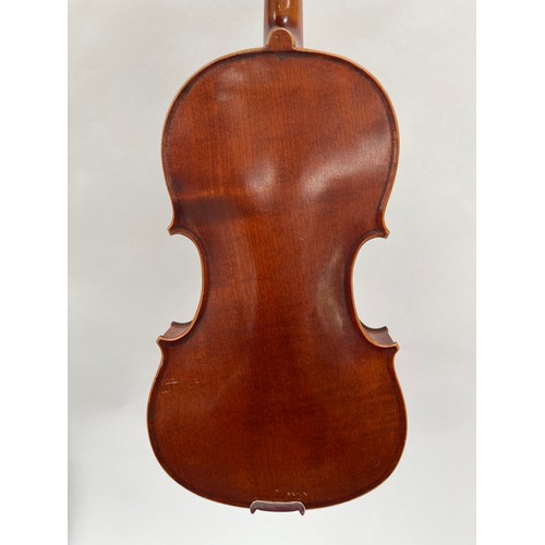 8051 - A 20th Century Medio-Fino label violin, three quarter size (3/4), cased