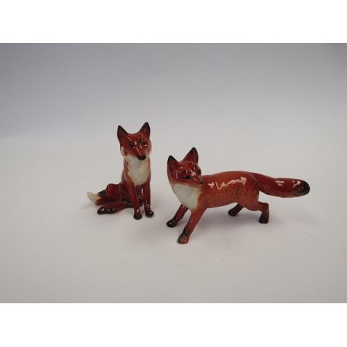 9062 - Two Beswick Foxes in gloss, model no's 1748 (repaired) and 1440