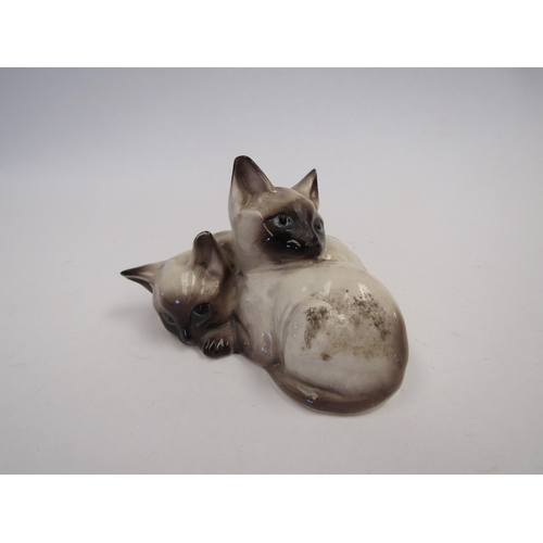 9071 - A Beswick pair of Siamese kittens curled together, in seal paint gloss, model no. 1296