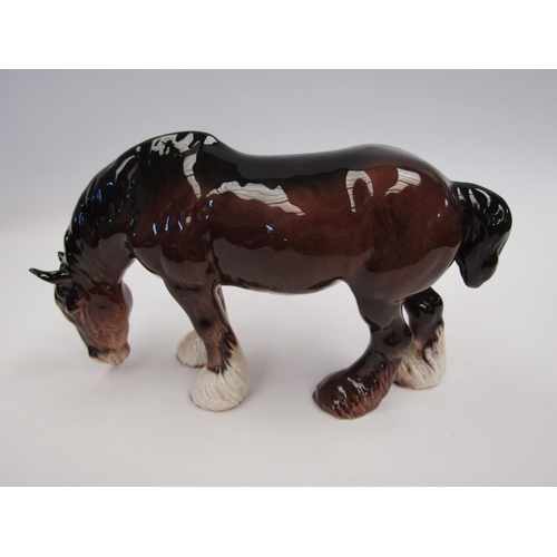 9077 - A Beswick Grazing Shire horse in brown gloss, model no. 1050