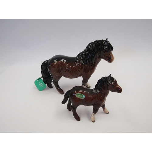 9090 - A Beswick Shetland Pony in brown gloss, model no. 1033 together with a Beswick Shetland Foal in brow... 