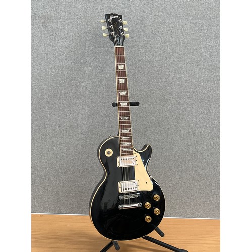 8172 - A 1992 Gibson Les Paul Standard electric guitar with black body, serial number 91552417, selector sw... 