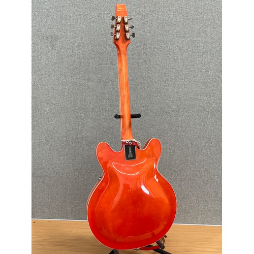 8171 - A Baldwin model 706V semi-acoustic electric guitar, burnt orange colour body, by Jim Burns