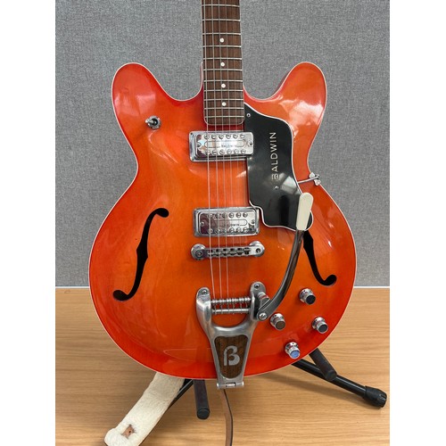 8171 - A Baldwin model 706V semi-acoustic electric guitar, burnt orange colour body, by Jim Burns