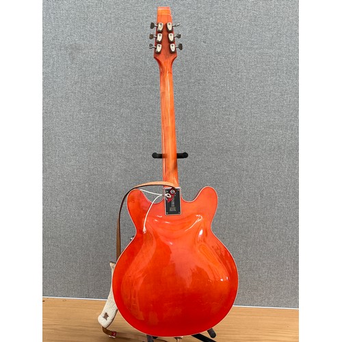 8171 - A Baldwin model 706V semi-acoustic electric guitar, burnt orange colour body, by Jim Burns