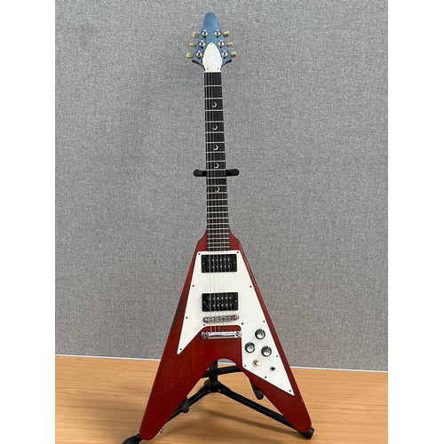 8175 - A Gibson 2002 Flying V electric guitar with crescent moon mother-of-pearl inlay, worn cherry body, s... 