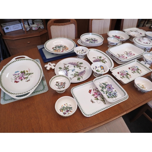 1073 - A large collection of Portmeirion Botanic Garden wares including rolling pin, measuring spoons, loaf... 