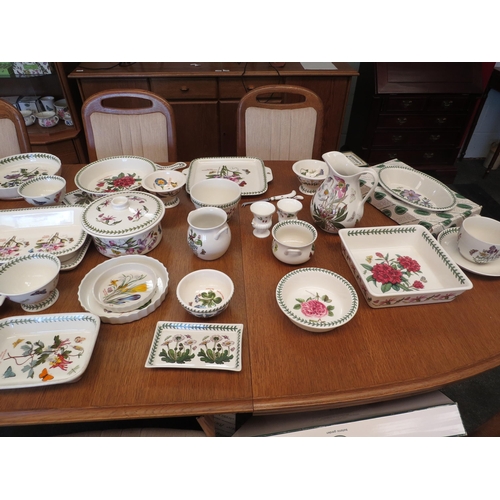 1073 - A large collection of Portmeirion Botanic Garden wares including rolling pin, measuring spoons, loaf... 