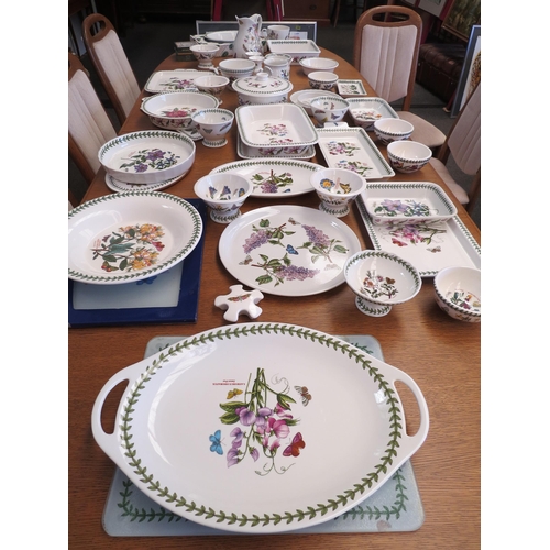 1073 - A large collection of Portmeirion Botanic Garden wares including rolling pin, measuring spoons, loaf... 