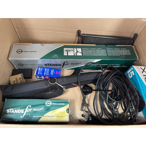 8037 - A box of mixed music equipment including Audix directional microphone and music stands etc. Please n... 