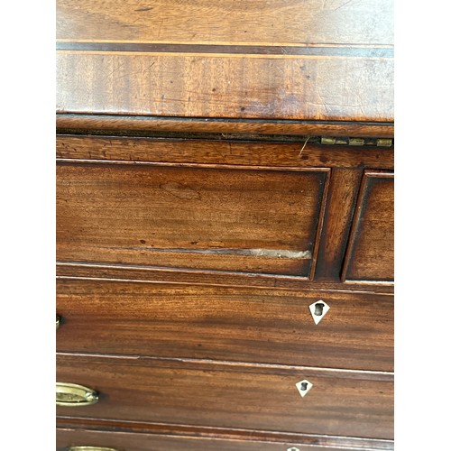 4028 - A George III mahogany bureau, crossbanded fall front opening to reveal a fitted interior, over two s... 